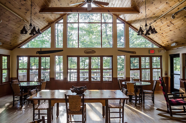 living and dining room with 2 story windows