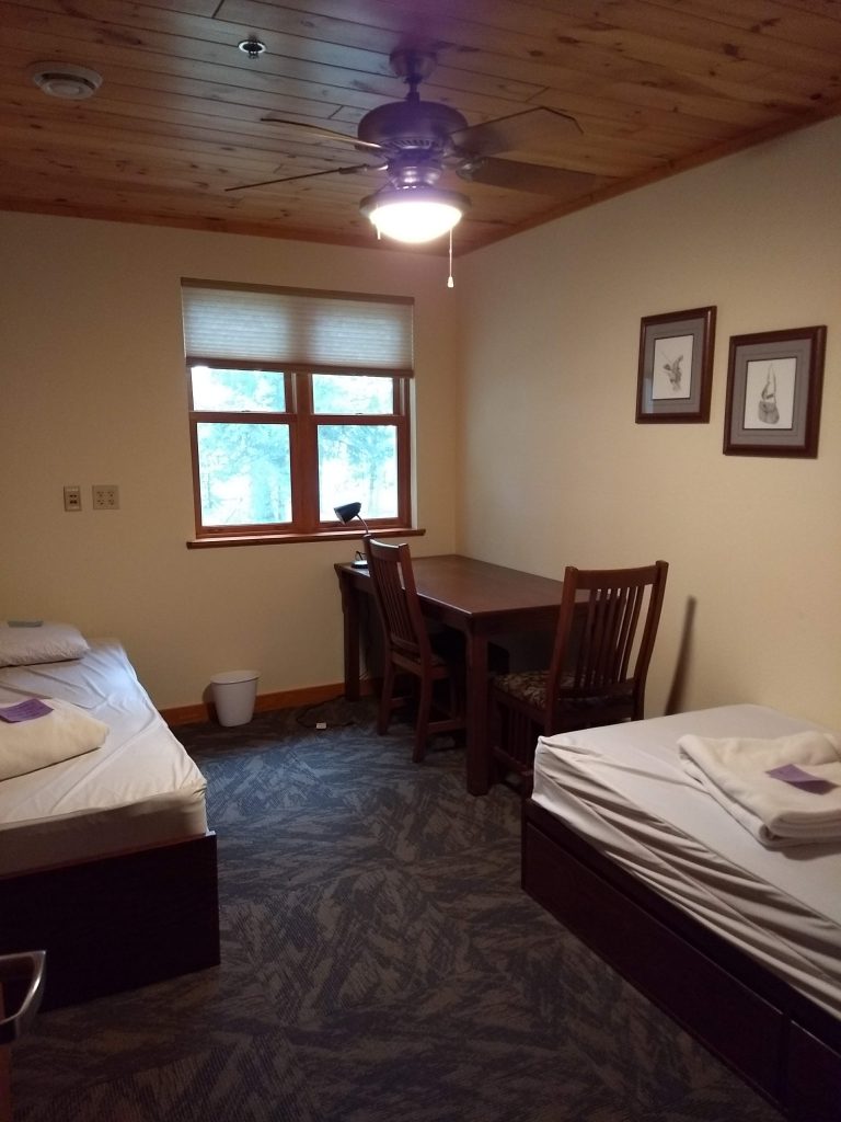 two twin beds and desk